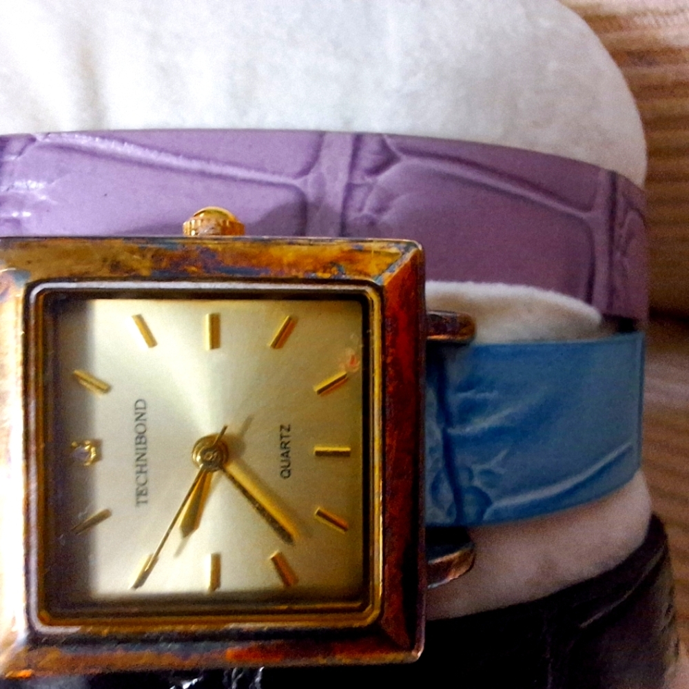 A 925 technibond watch with 3 replaceable leather straps